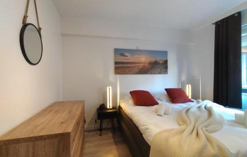 Katil atau katil-katil dalam bilik di Cozy Apartment In Oostende