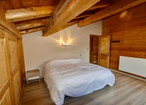 Ένα ή περισσότερα κρεβάτια σε δωμάτιο στο Chalet Pti Prince