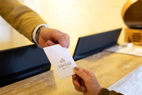 Certificato, attestato, insegna o altro documento esposto da Zafora Cave Suites Hotel Cappadocia