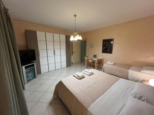 Ένα ή περισσότερα κρεβάτια σε δωμάτιο στο B&B Lavinaio