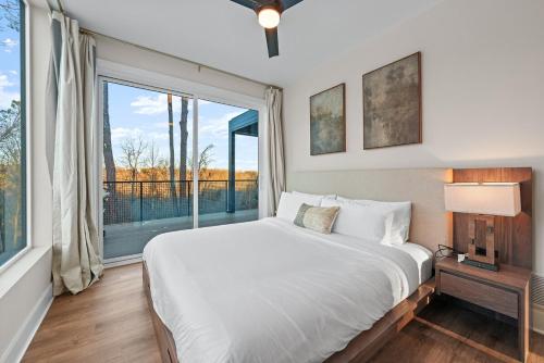 a bedroom with a large bed and a large window at Adamina Canyon Luxurious, Canyon View 5BR, 3BTH 1 in Rockbridge