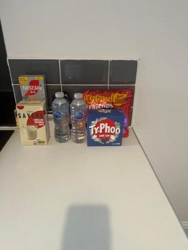 a group of water bottles sitting on a counter at Northumberland Road Studios in Coventry