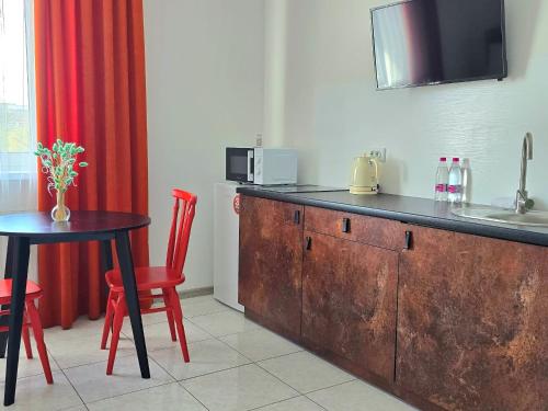 Kuchyň nebo kuchyňský kout v ubytování TREND HOUSE Apartments