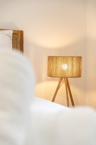 Ein Bett oder Betten in einem Zimmer der Unterkunft Le Domaine de l'Anse Mitan