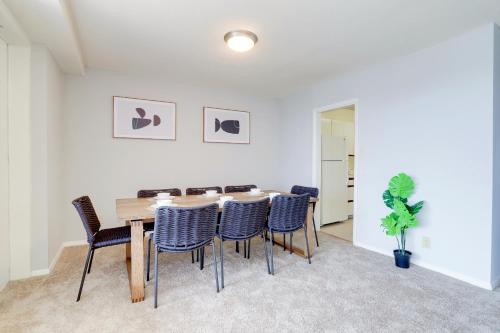 a dining room with a table and chairs at Family-Sized 3BR Retreat Minutes from Reagan National in Arlington