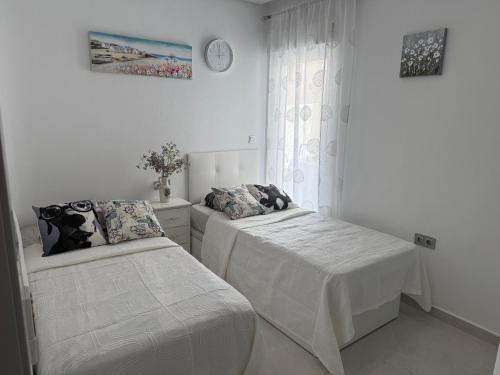 Postel nebo postele na pokoji v ubytování Residenz Ramon Gallud