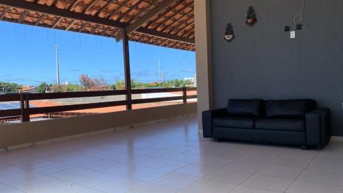 Χώρος καθιστικού στο Casa temporada Praia do Frances