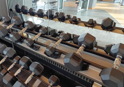 a row of seats in a lecture hall at Premium Collins Boulevard Near Airport in Pakulonan Tiga