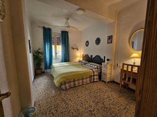 Ένα ή περισσότερα κρεβάτια σε δωμάτιο στο Guest House Capitan Meca