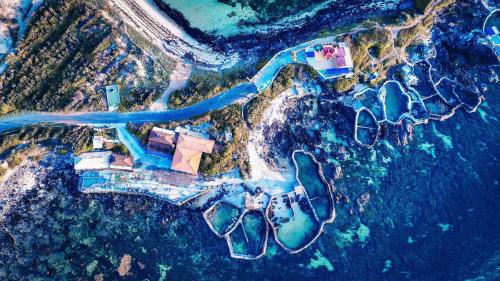 an aerial view of a house on a island in the ocean at Long Vĩ hotel - đảo Phú Quý in Cu Lao Thu