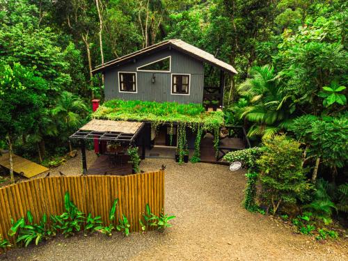 Taman di luar Aconchego dos Pássaros