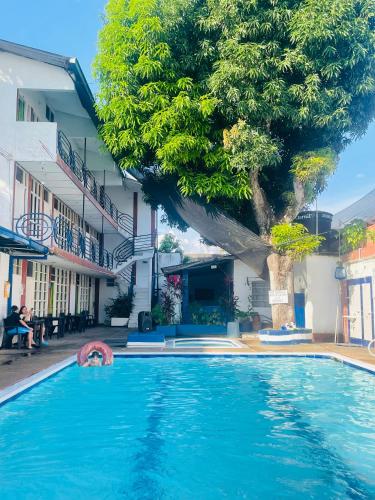 Bazén v ubytování Hotel el capricho nebo v jeho okolí