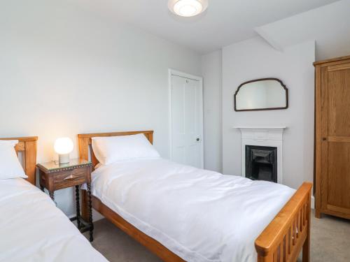 Ένα ή περισσότερα κρεβάτια σε δωμάτιο στο Middle Lodge