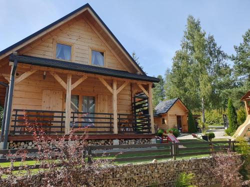 Taman di luar Borowikowe Zacisze drewniane domy z dostępem do balii i sauny