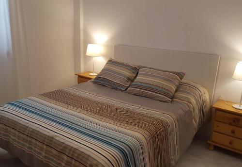 Ένα ή περισσότερα κρεβάτια σε δωμάτιο στο Beautiful apartment in El Medano