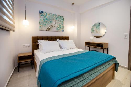 Ένα ή περισσότερα κρεβάτια σε δωμάτιο στο Beautiful Alice Luxury Suites