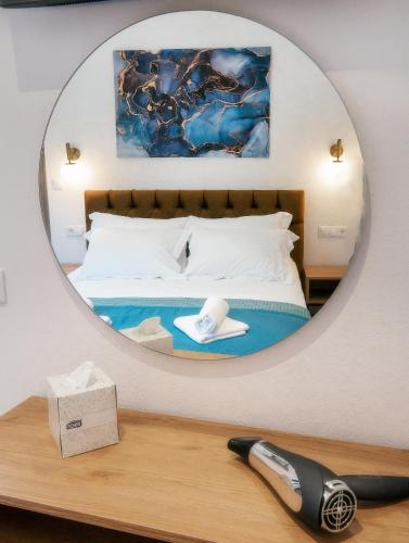 Ένα ή περισσότερα κρεβάτια σε δωμάτιο στο Beautiful Alice Luxury Suites