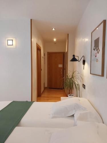 Postel nebo postele na pokoji v ubytování Hotel Nochendi