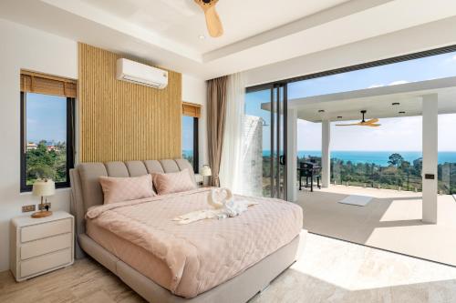 Un pat sau paturi într-o cameră la Villa Gala 4br fantastic views