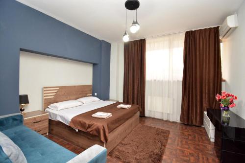 Postel nebo postele na pokoji v ubytování hotel Pushkin