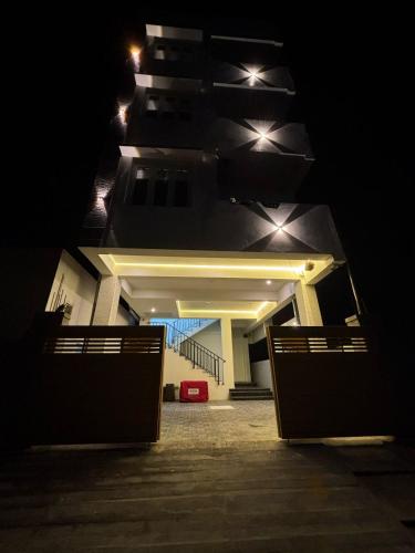 a view of a building at night at TVK Grands 7 - Premium Two Bedroom Apartment in Coimbatore