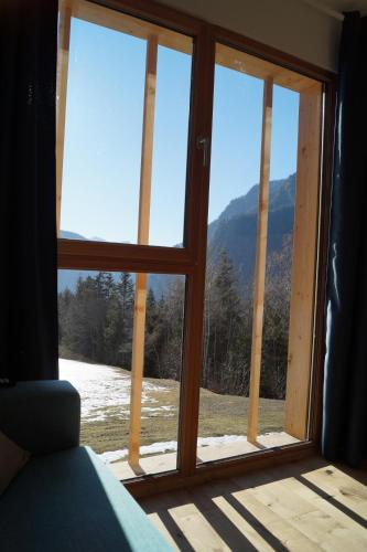 a window with a view of a mountain view at Laimbruchhof Apartments Urlaub auf dem Bauernhof in Val di Vizze