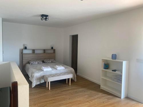 Ένα ή περισσότερα κρεβάτια σε δωμάτιο στο Casa Candido