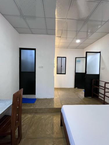 Postel nebo postele na pokoji v ubytování Unawatuna White Villa