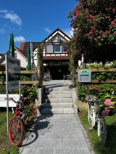 a couple of bikes parked in front of a house at Groasmückle Apartment in Tauberbischofsheim