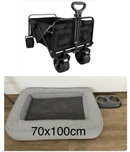 a grey sink with a grey tray on a floor at The Fehmarn Lodges - OASIS - in Fehmarn