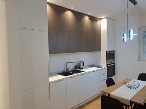 Køkken eller tekøkken på Centar Apartment