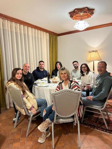 a group of people sitting around a table at Dar terrae plus in Chefchaouene