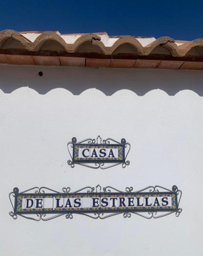 a sign on the side of a building at 3 bedroom holiday home Alcaucin with private pool and mountain view in Alcaucín