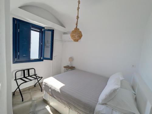 Ένα ή περισσότερα κρεβάτια σε δωμάτιο στο Oia's Secret