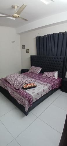 Llit o llits en una habitació de Capital Square