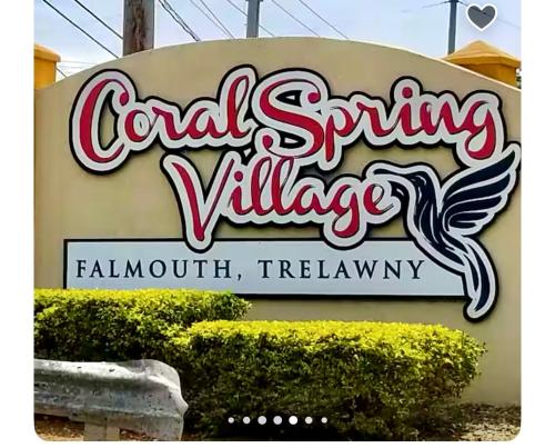 a sign for a carling villeilleille restaurant at 2 Love Birds Abode 3 Minutes to Beach in Falmouth