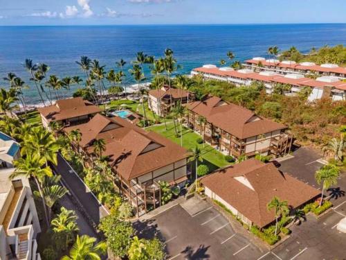an aerial view of a resort with the ocean at Kona Isle B22 in Kailua-Kona