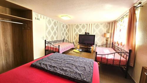 Postel nebo postele na pokoji v ubytování Gründauer Monteurwohnung/Studentenwohnung
