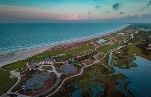 an aerial view of a resort next to the ocean at 165 Surfsong Road by Akers Ellis Rentals in Kiawah Island