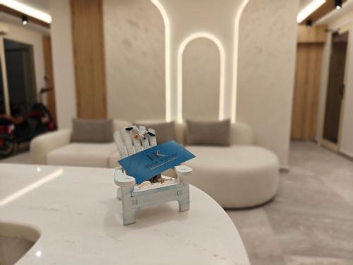 a toy sitting on a table in a living room at Klebrido Hotel and Restaurant in Durrës