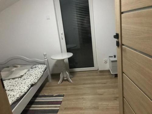 Postel nebo postele na pokoji v ubytování Stefanowy Domek
