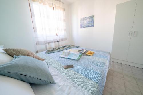 Ένα ή περισσότερα κρεβάτια σε δωμάτιο στο Apartment in the greenery near the Cinque Terre