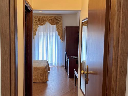 Una cama o camas en una habitación de Hotel Soleado