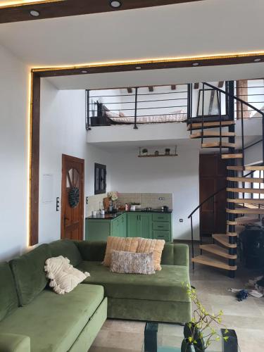 Area soggiorno di Alex House