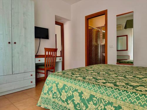 Una cama o camas en una habitación de Hotel Soleado