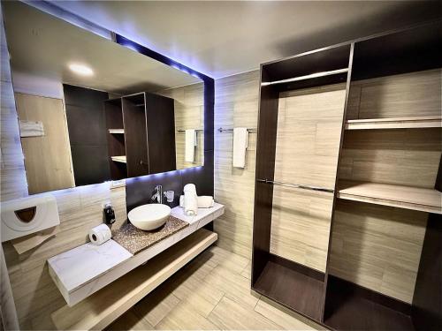 Koupelna v ubytování Hotel American Visa Normandia