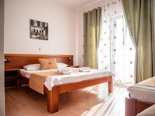 Ένα ή περισσότερα κρεβάτια σε δωμάτιο στο Apartments Bonita