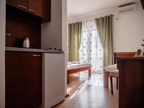 Kuchyň nebo kuchyňský kout v ubytování Apartments Bonita