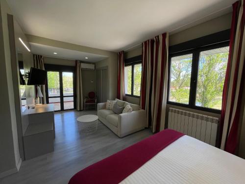 Posteľ alebo postele v izbe v ubytovaní Hotel Valjunco