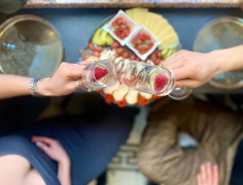 a group of people holding glasses of wine at Flow - City Centre Zadar in Zadar